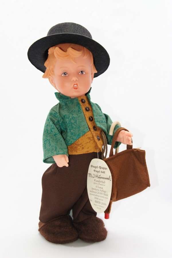 hummel boy with umbrella and suitcase