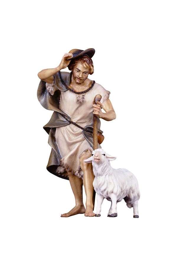 Herder met stok en schaap