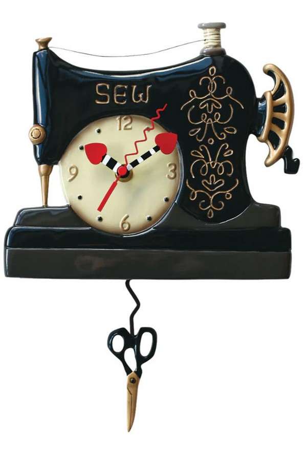 Klok naaimachine vintage met schaar