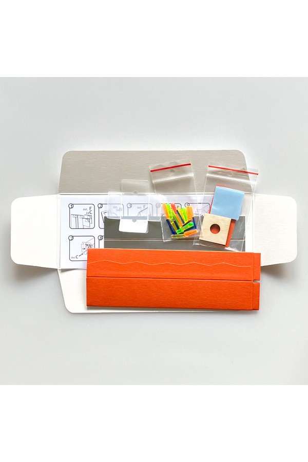 DIY kaleidoscoop met oranje buitenkant