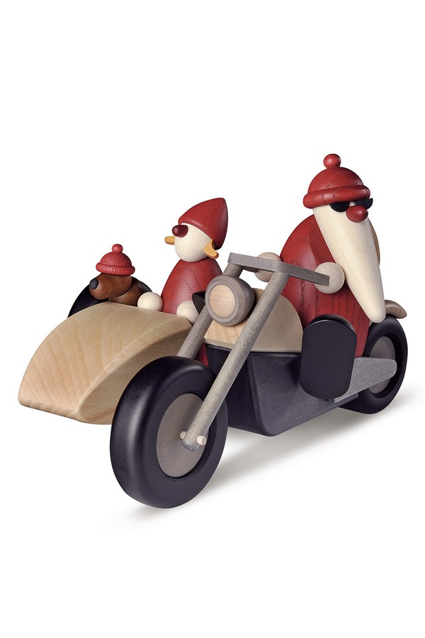 Familie-uitstapje op de motor, in kerstsfeer